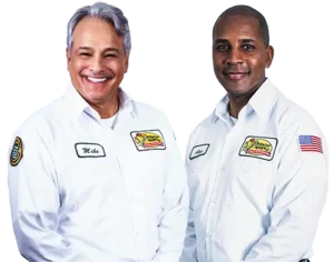 Mister Sparky Sarasota electricians Mike and Alex in uniform, ready to assist homeowners with electrical services.